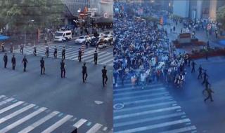 上海外滩拉链式人墙的原因 上海武警拉链式人墙